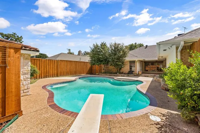 a front view of a house with a garage