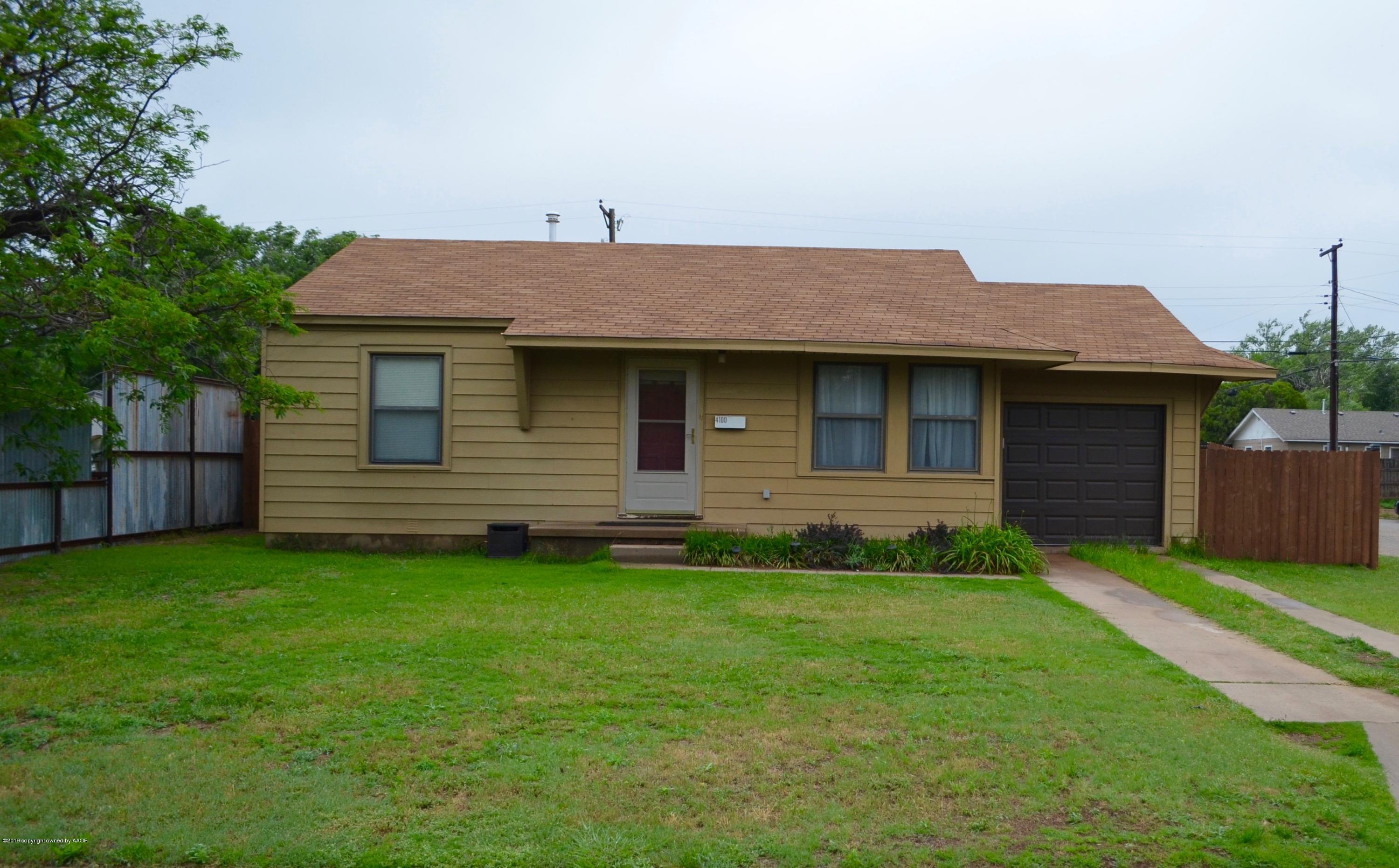 4100 Cline Road Amarillo, TX 79110 - Photo 1 of 10 a front view of a house with a garden