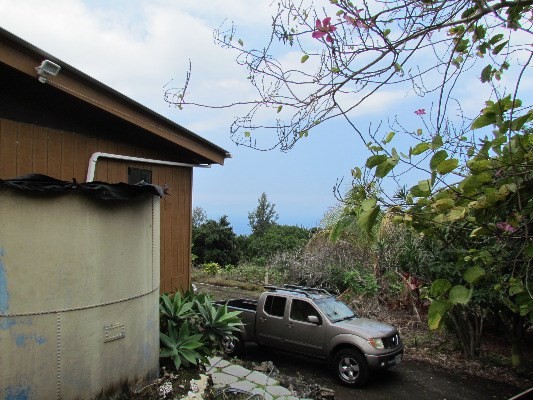 88-2512 Milolii Road Captain Cook, HI 96704 - Photo 4 of 24 a car parked in front of a house