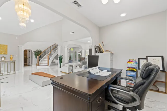 a view of a livingroom with furniture and a livingroom