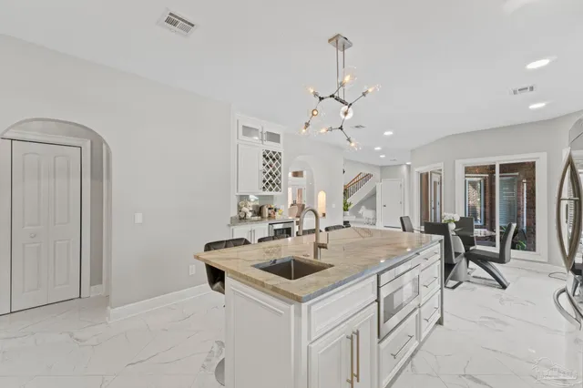 a view of a hallway view with living room
