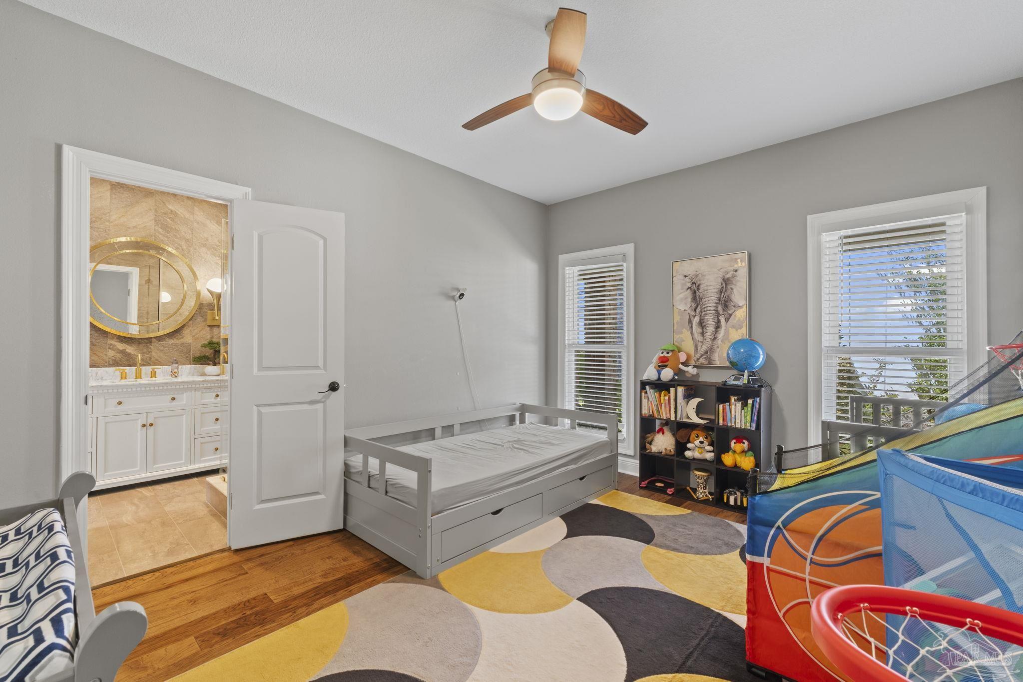 4818 Rosemont Place Pensacola, FL 32514 - Photo 32 of 69 a bedroom with furniture and a window