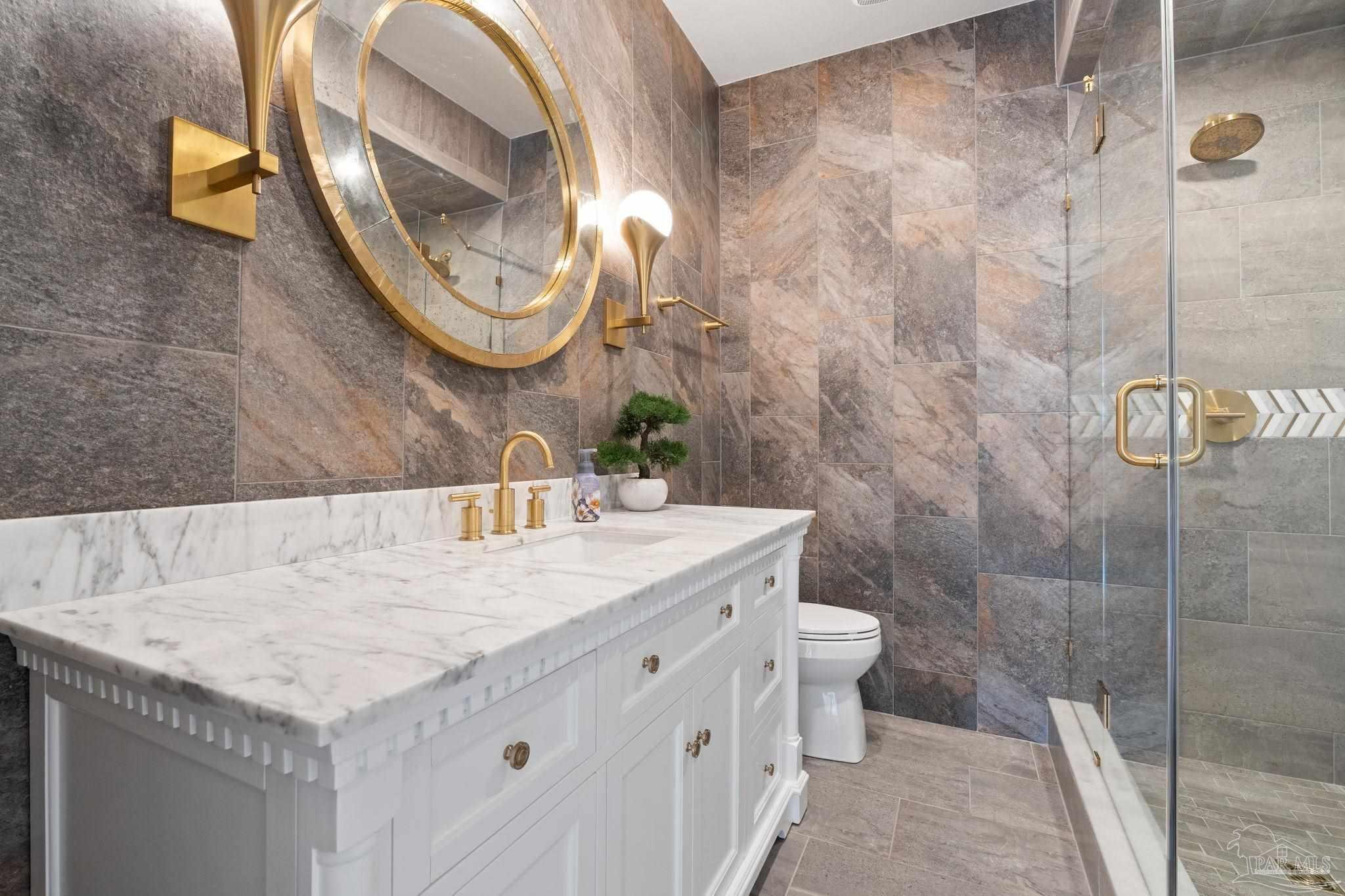 4818 Rosemont Place Pensacola, FL 32514 - Photo 33 of 69 a bathroom with a sink and a mirror