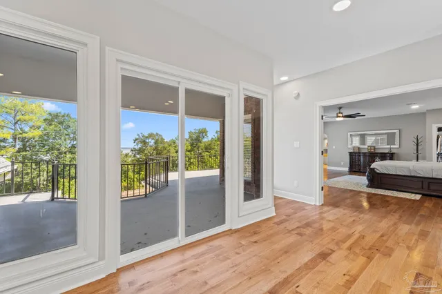 a view of a patio with furniture and garden