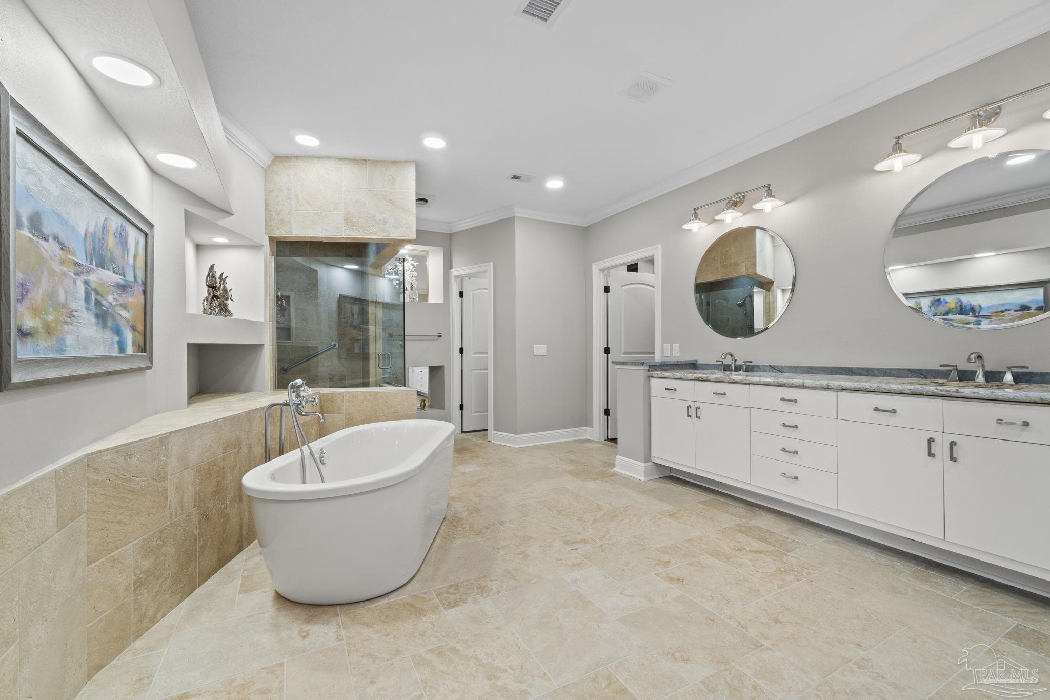 4818 Rosemont Place Pensacola, FL 32514 - Photo 44 of 69 a spacious bathroom with a large tub sink and mirror