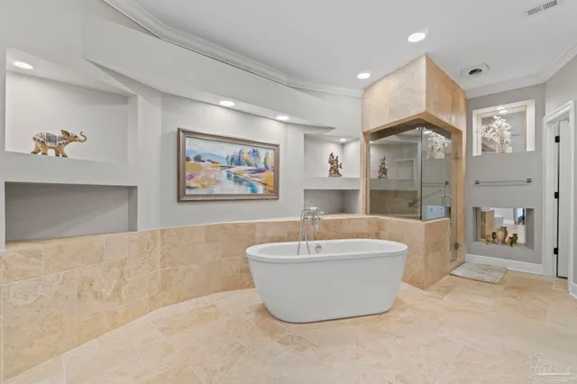 an aerial view of residential house with outdoor space and swimming pool