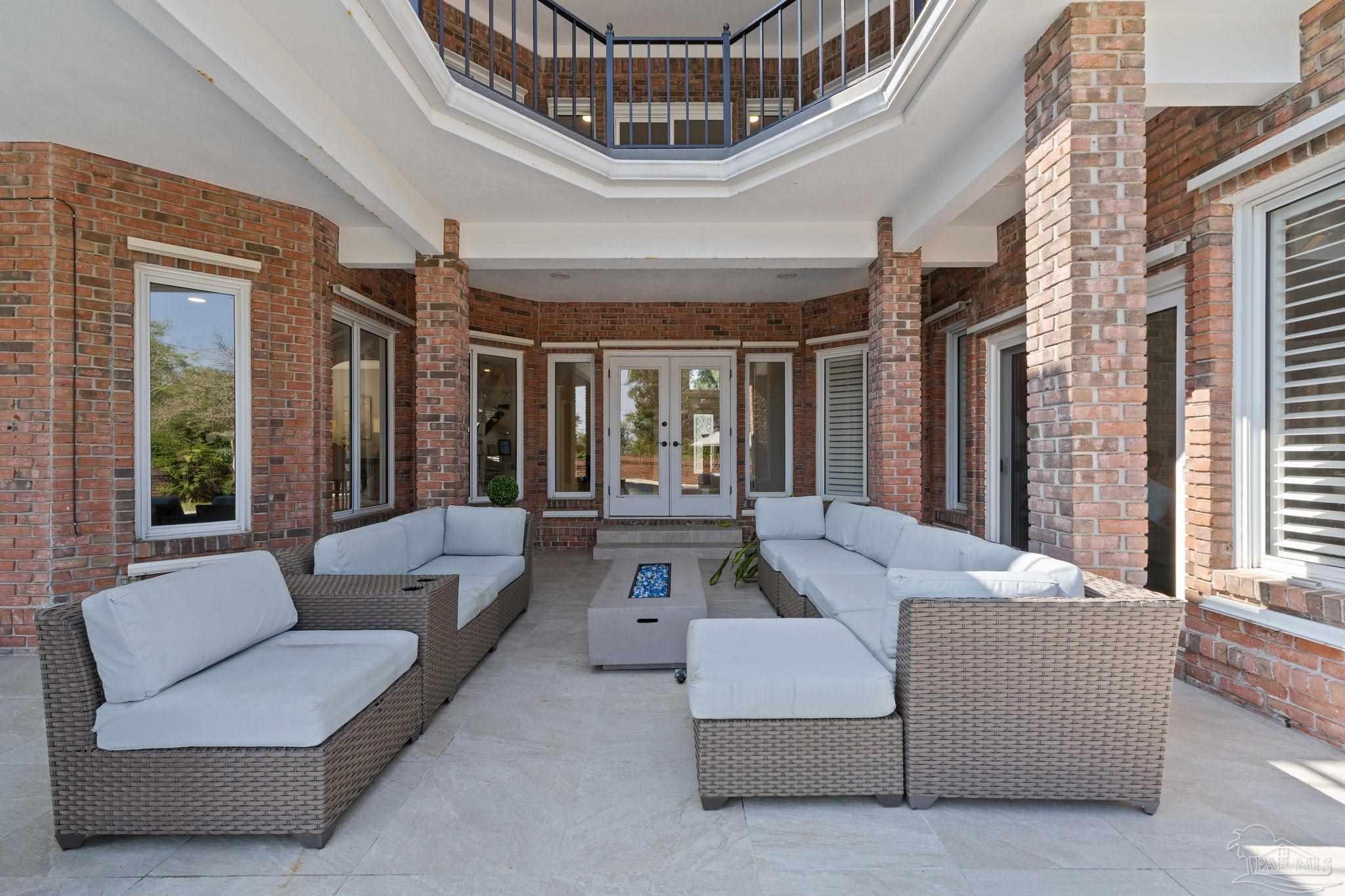 4818 Rosemont Place Pensacola, FL 32514 - Photo 51 of 69 a living room with furniture and a large window