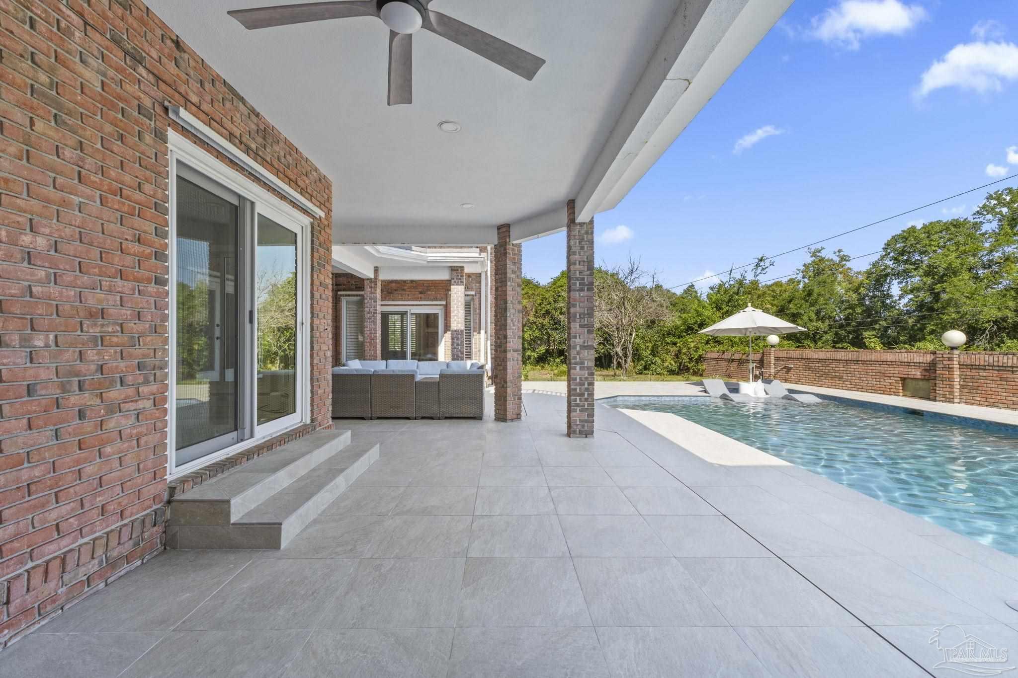 4818 Rosemont Place Pensacola, FL 32514 - Photo 53 of 69 a view of a patio with furniture and garden