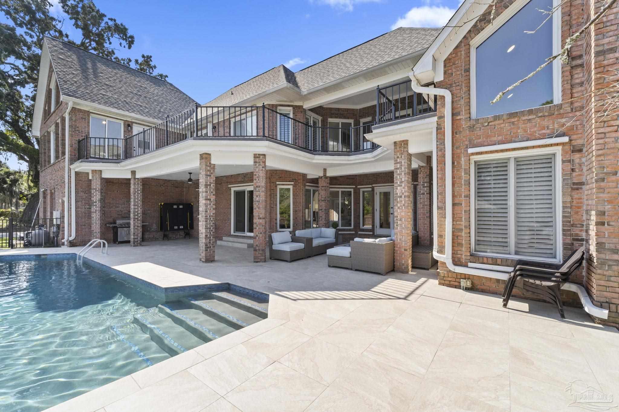 4818 Rosemont Place Pensacola, FL 32514 - Photo 55 of 69 a view of a building with sitting area