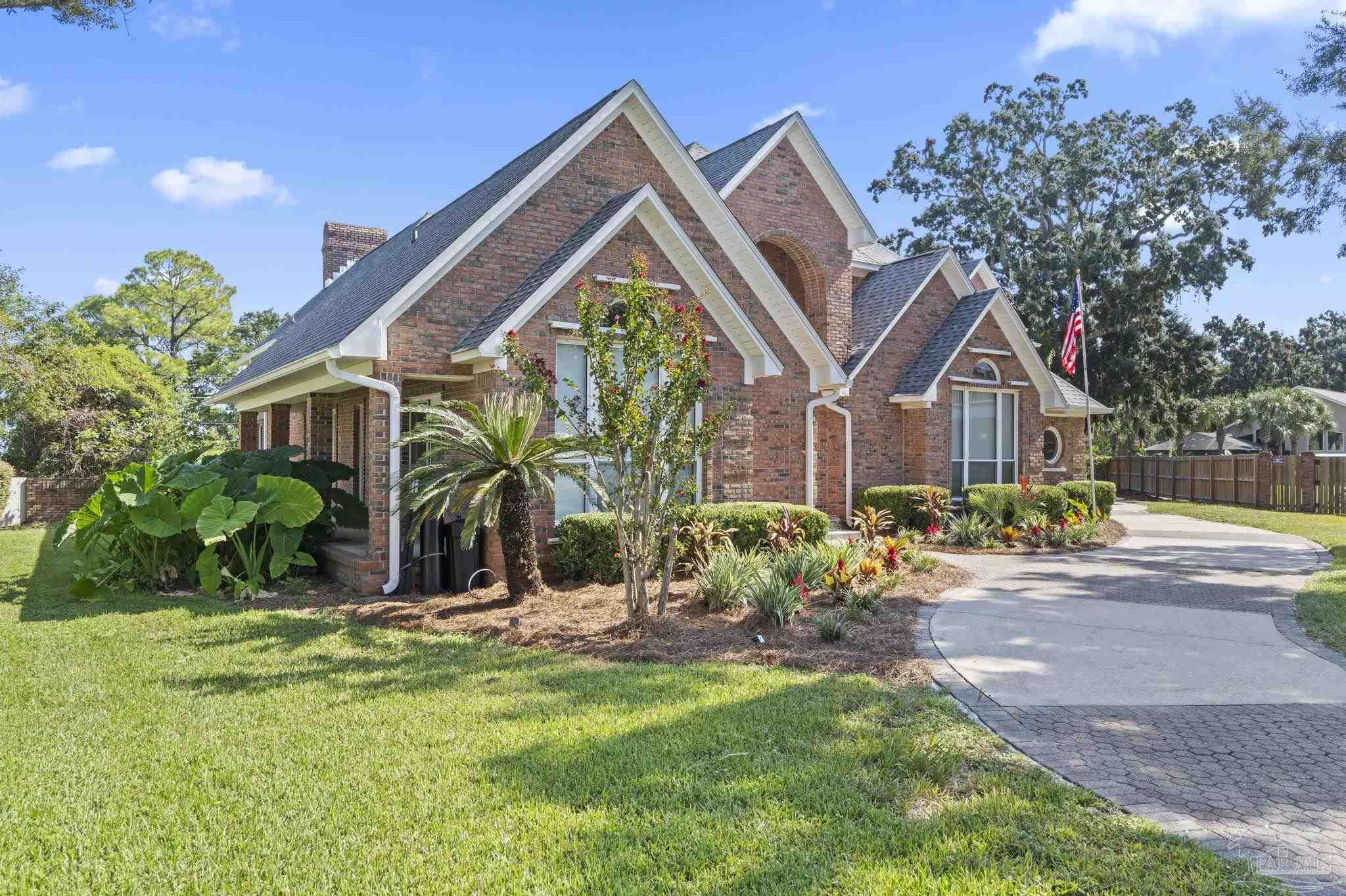 4818 Rosemont Place Pensacola, FL 32514 - Photo 59 of 69 a view of an house with backyard and sitting area