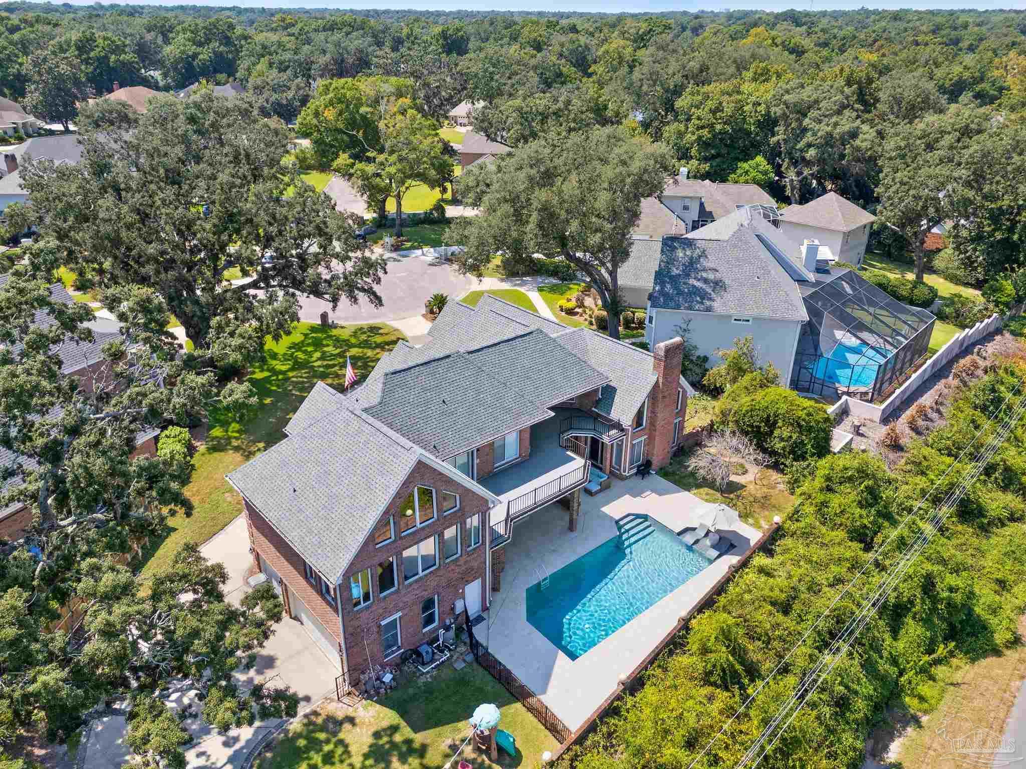 4818 Rosemont Place Pensacola, FL 32514 - Photo 62 of 69 an aerial view of residential house with outdoor space and swimming pool
