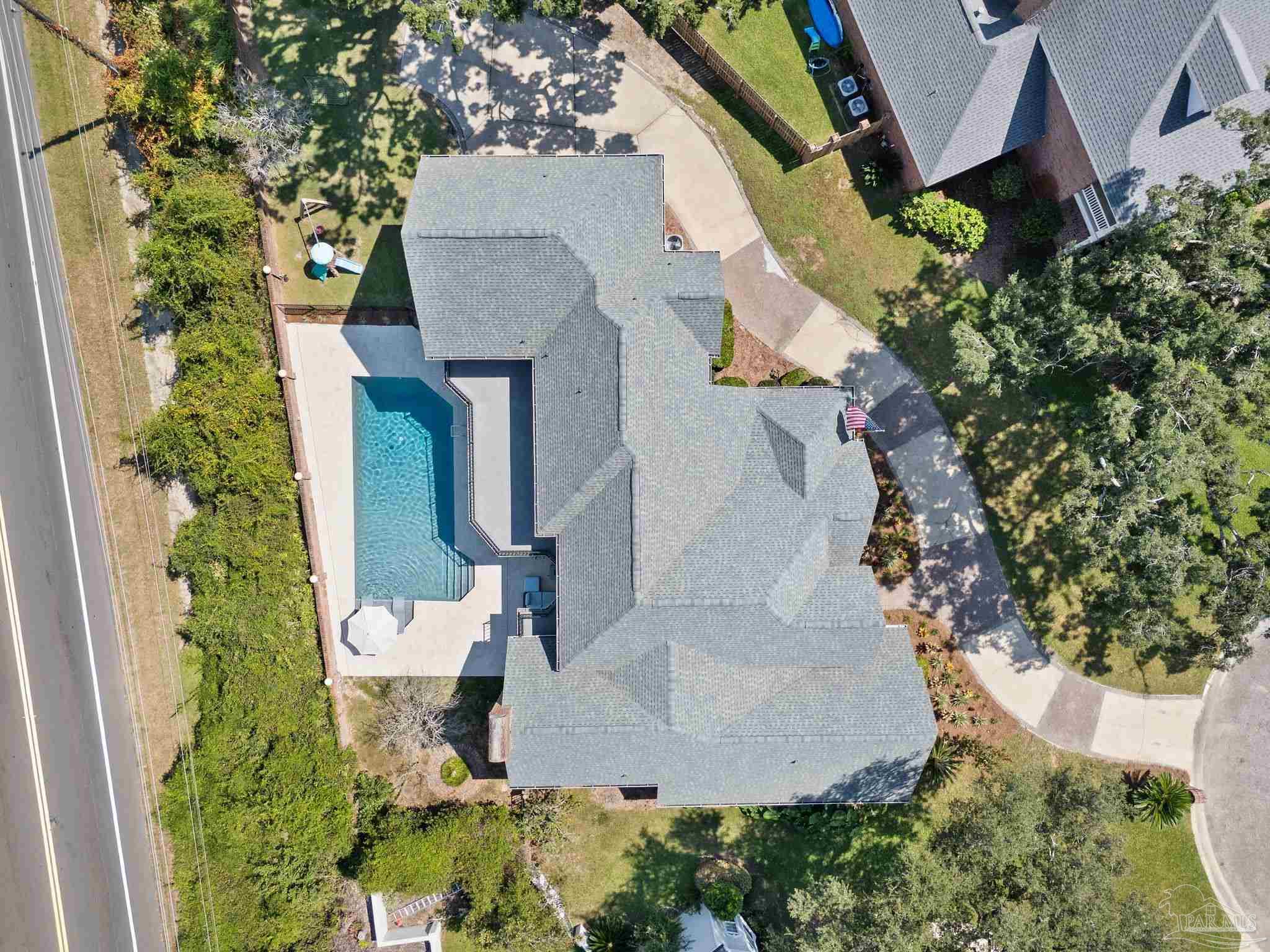 4818 Rosemont Place Pensacola, FL 32514 - Photo 64 of 69 an aerial view of a house with outdoor space and trees all around