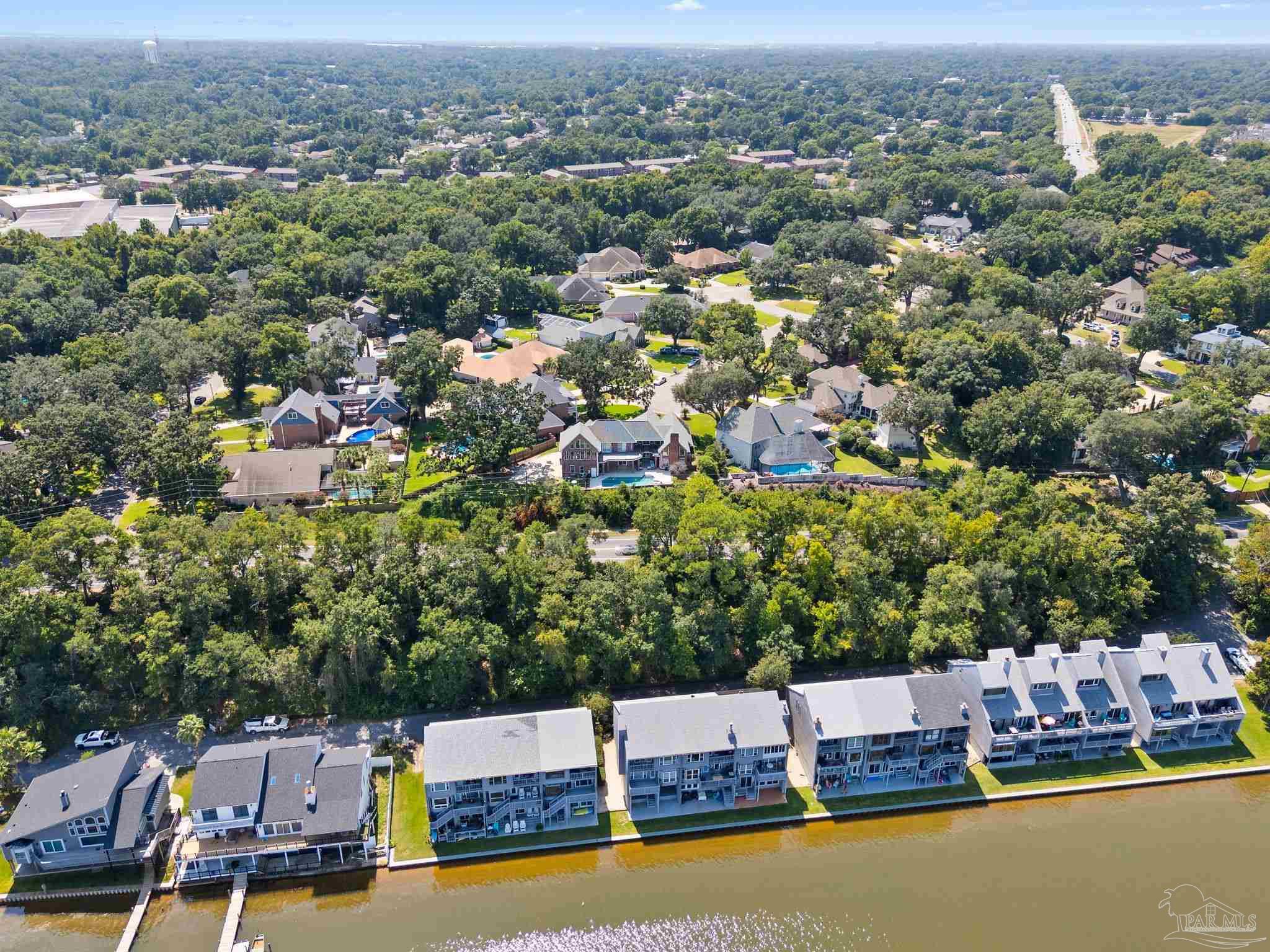 4818 Rosemont Place Pensacola, FL 32514 - Photo 66 of 69 an aerial view of a house with a garden and lake view