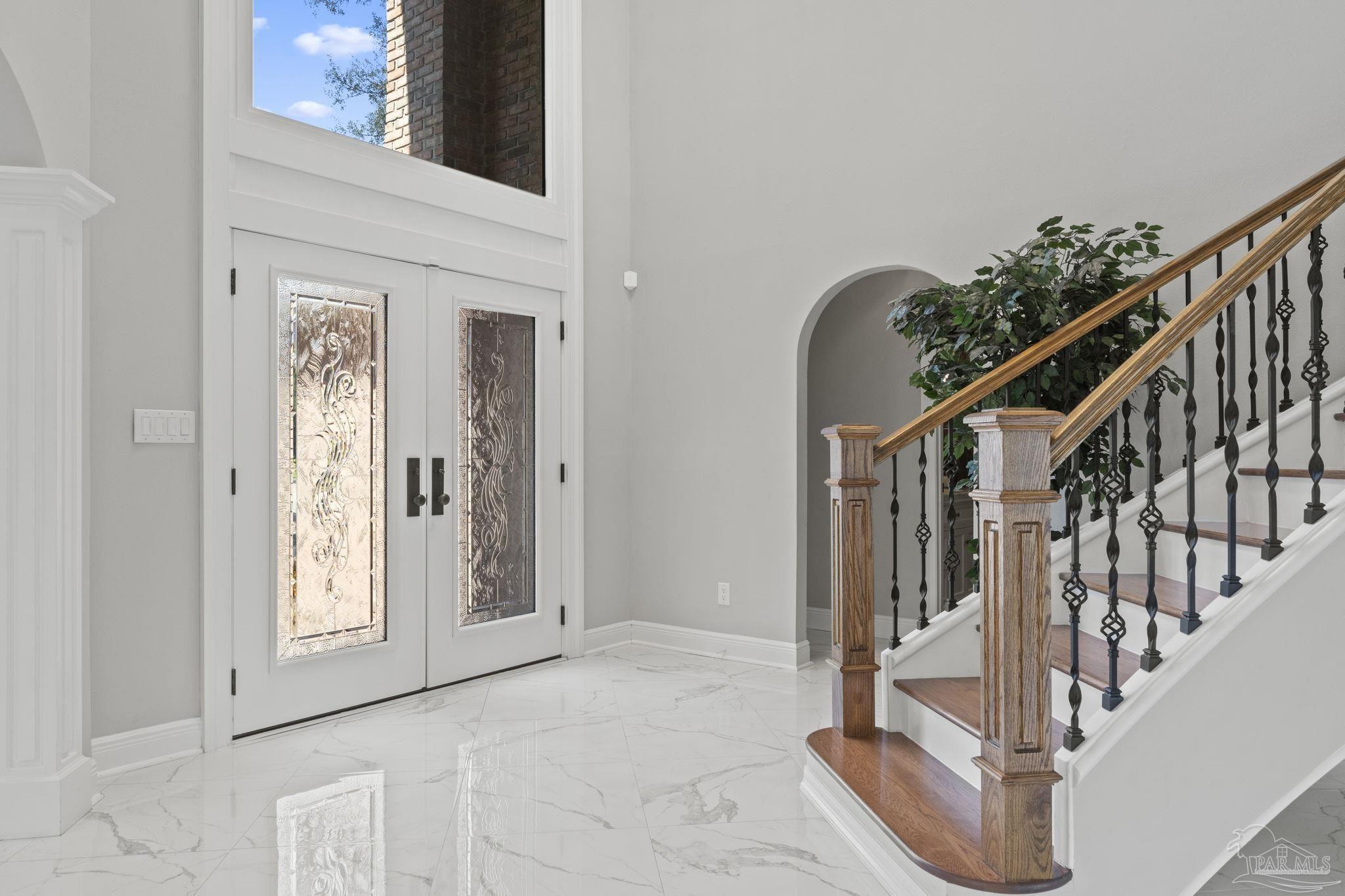 4818 Rosemont Place Pensacola, FL 32514 - Photo 7 of 69 a view of entryway and hall with wooden floor