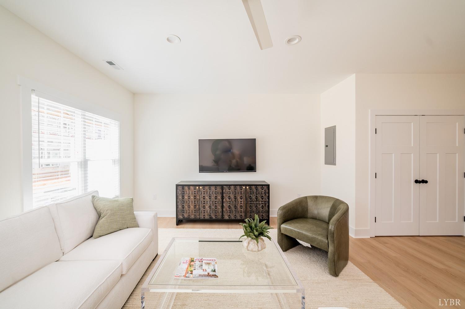 556 Leesville Road, Unit 208 Lynchburg, VA 24502 - Photo 13 of 40 a living room with furniture and a window