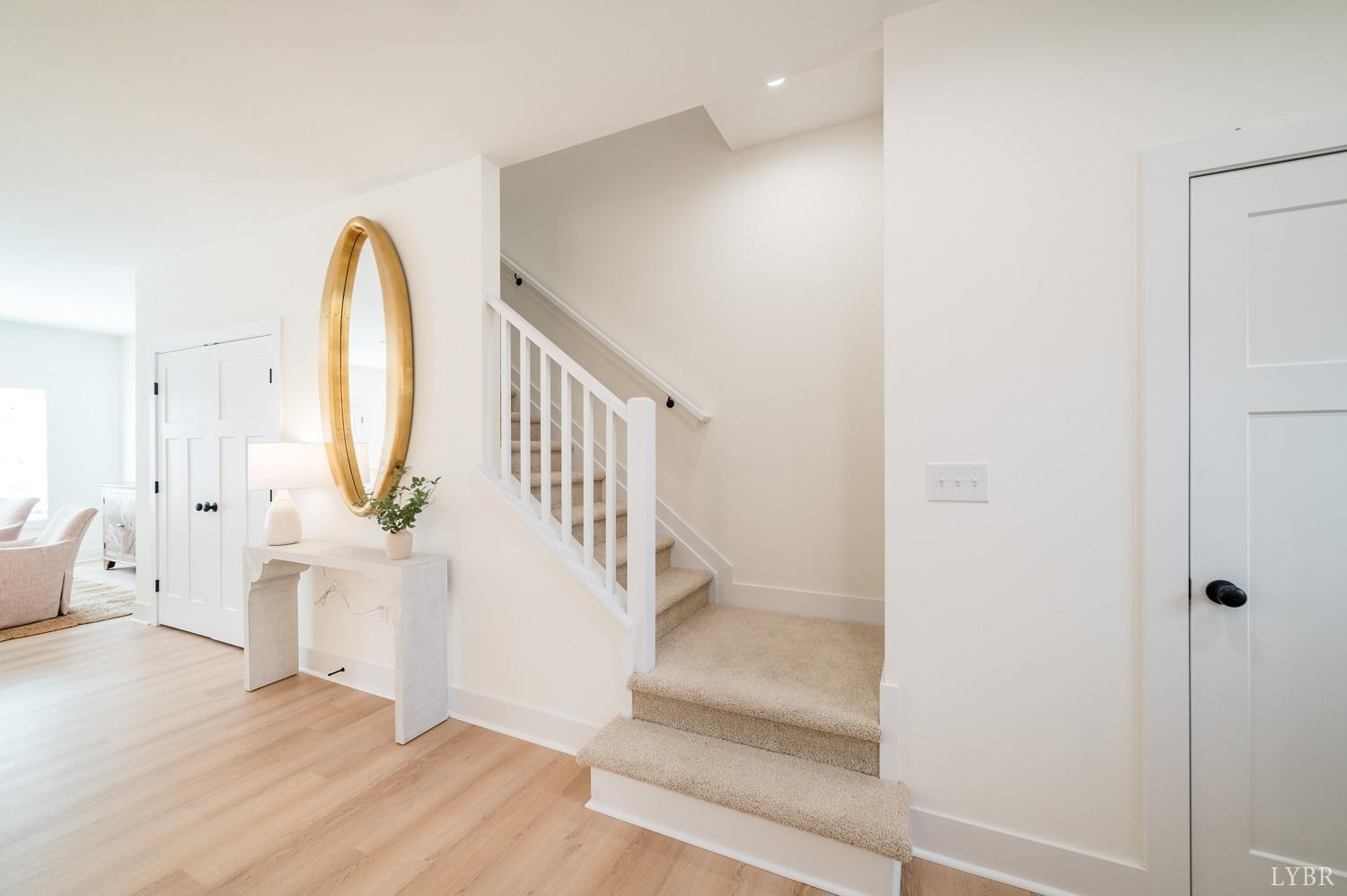 556 Leesville Road, Unit 208 Lynchburg, VA 24502 - Photo 18 of 40 a view of staircase with white walls and stairs