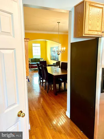 a view of a dining room with furniture and window