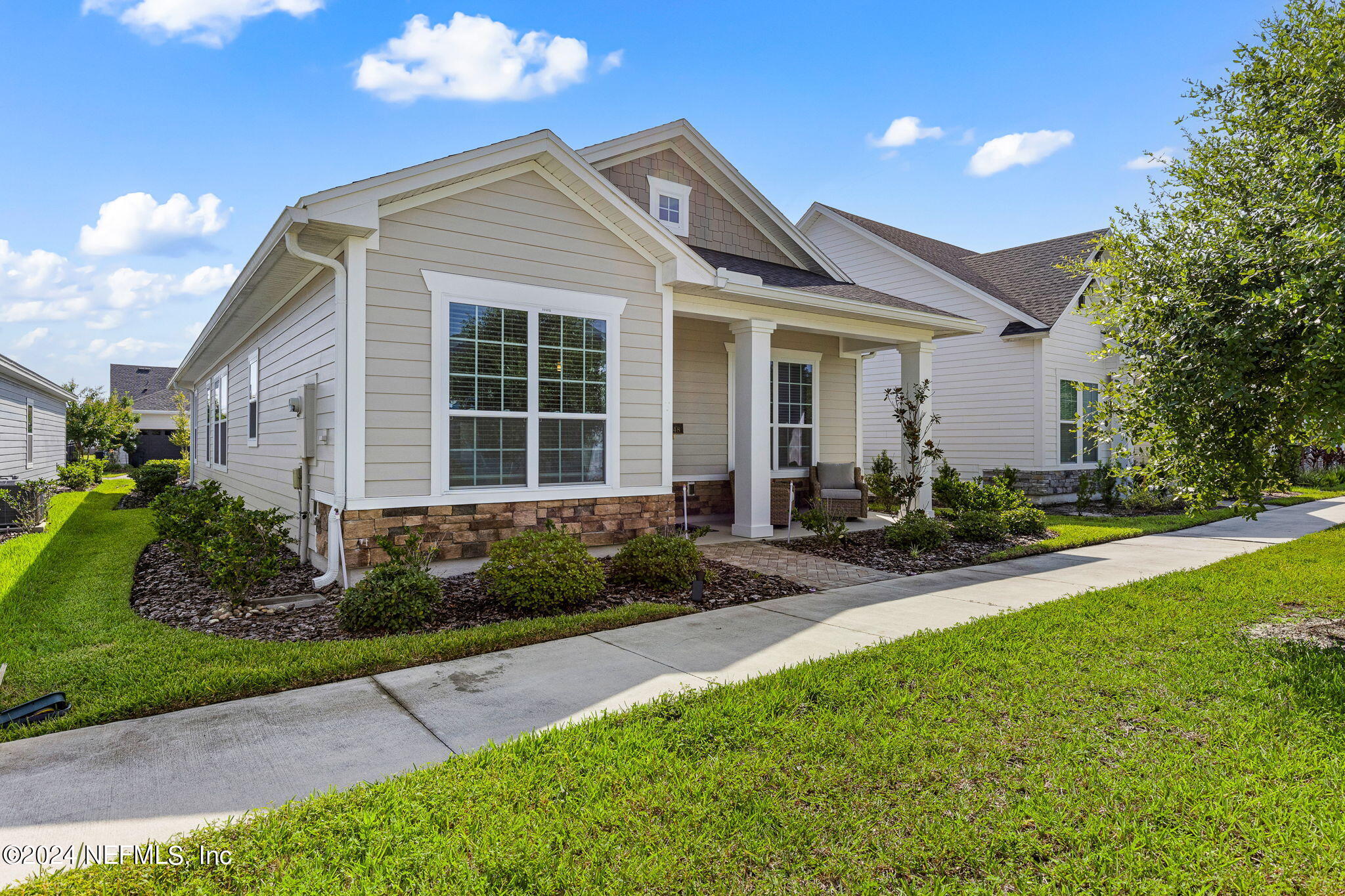 48 Bluebonnet Way St. Augustine, FL 32092 - Photo 1 of 47 a front view of a house with garden