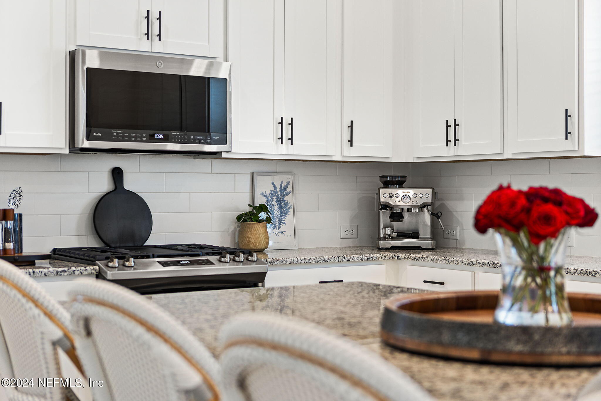 48 Bluebonnet Way St. Augustine, FL 32092 - Photo 12 of 47 a kitchen with a stove and a microwave