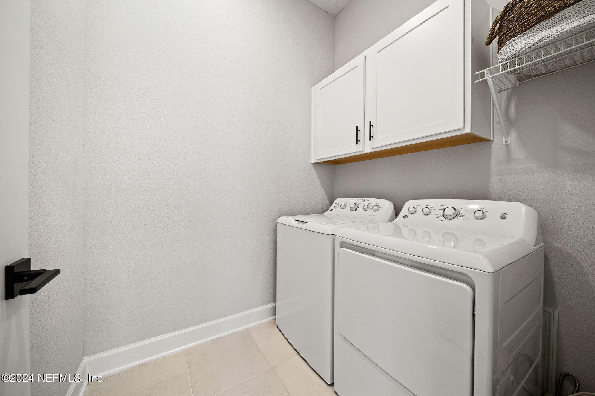 48 Bluebonnet Way St. Augustine, FL 32092 - Photo 25 of 47 a utility room with dryer and washer