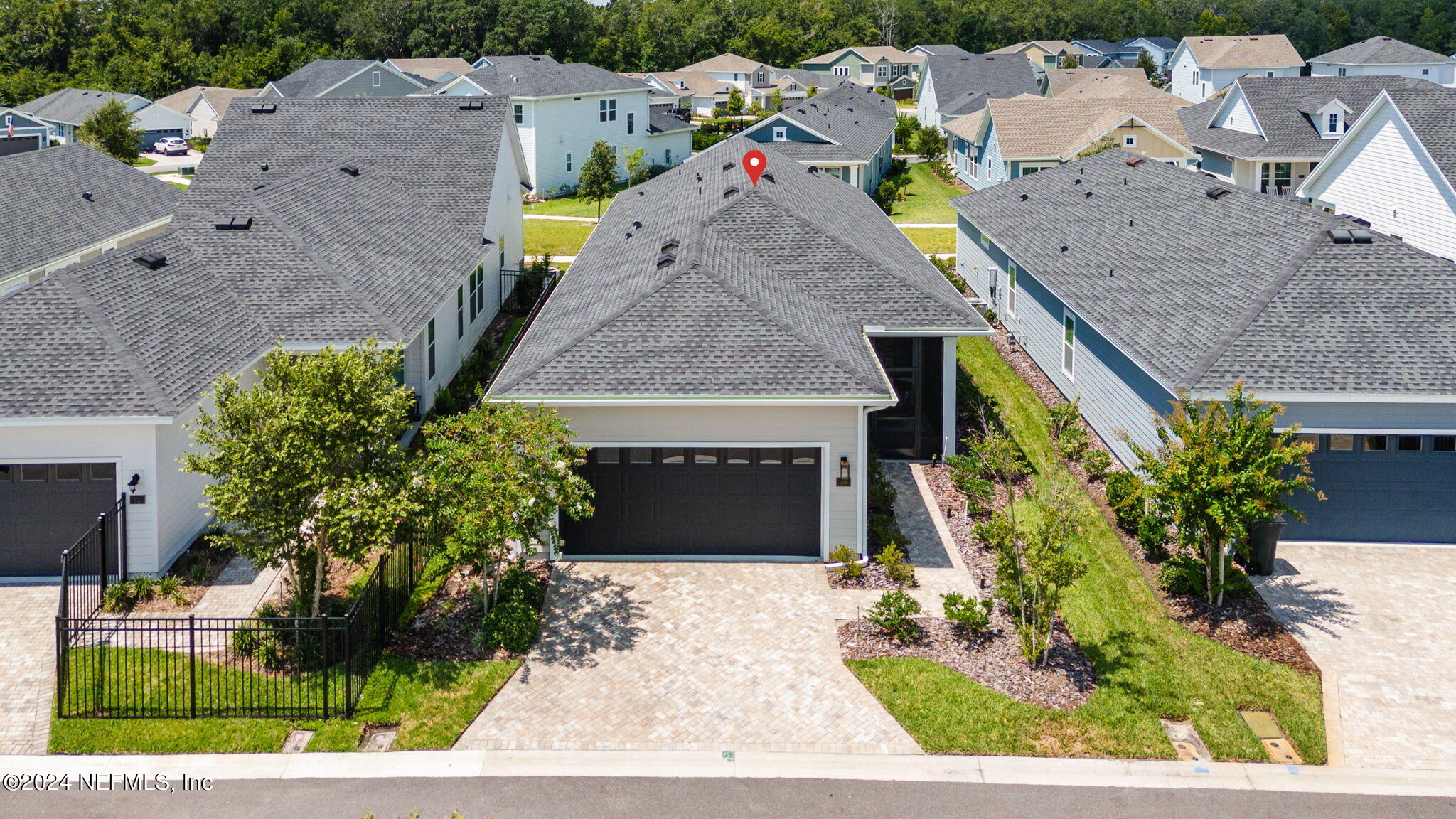 48 Bluebonnet Way St. Augustine, FL 32092 - Photo 29 of 47 a aerial view of a house with a garden and plants