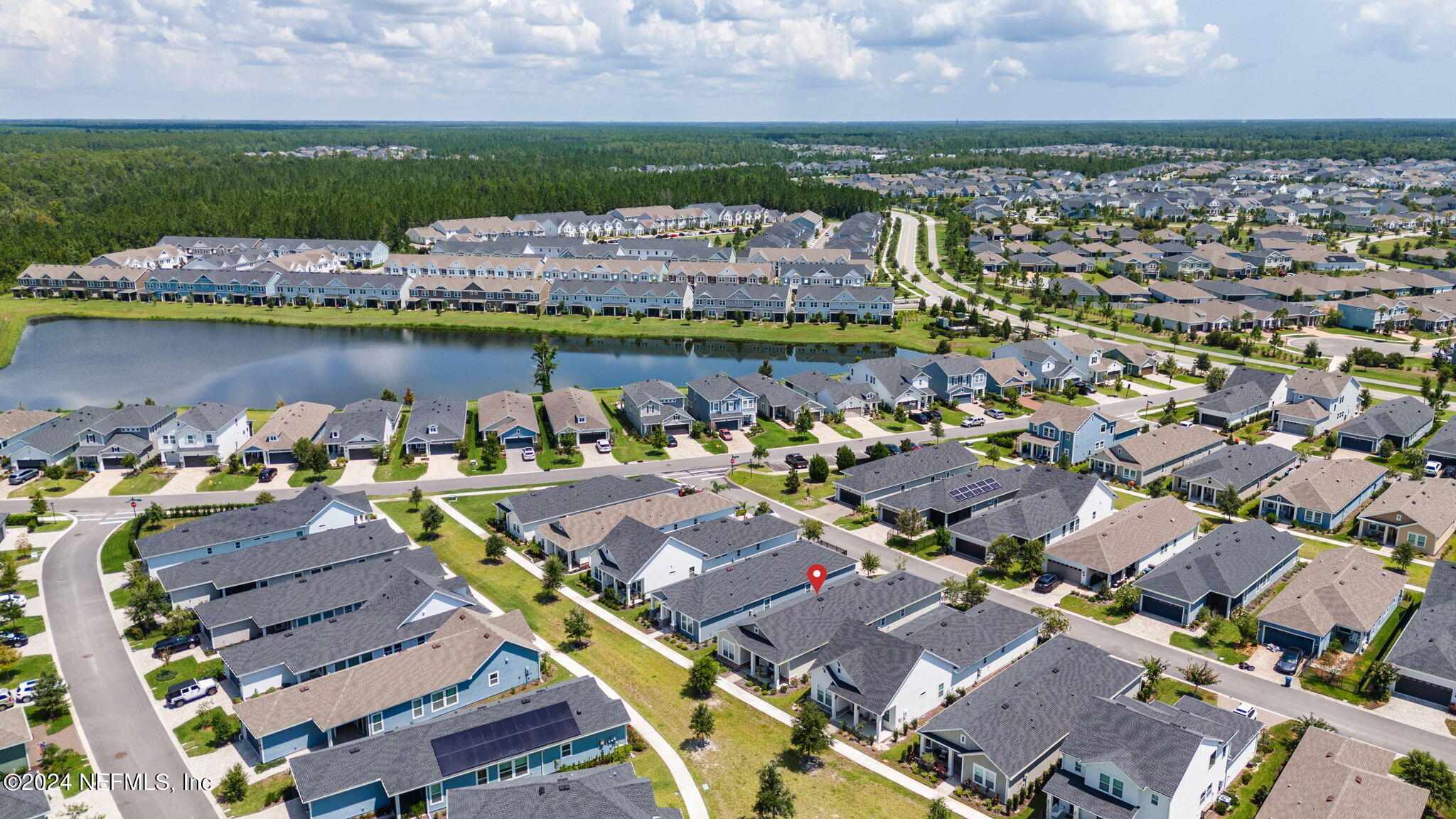 48 Bluebonnet Way St. Augustine, FL 32092 - Photo 30 of 47 an aerial view of a houses with a lake view