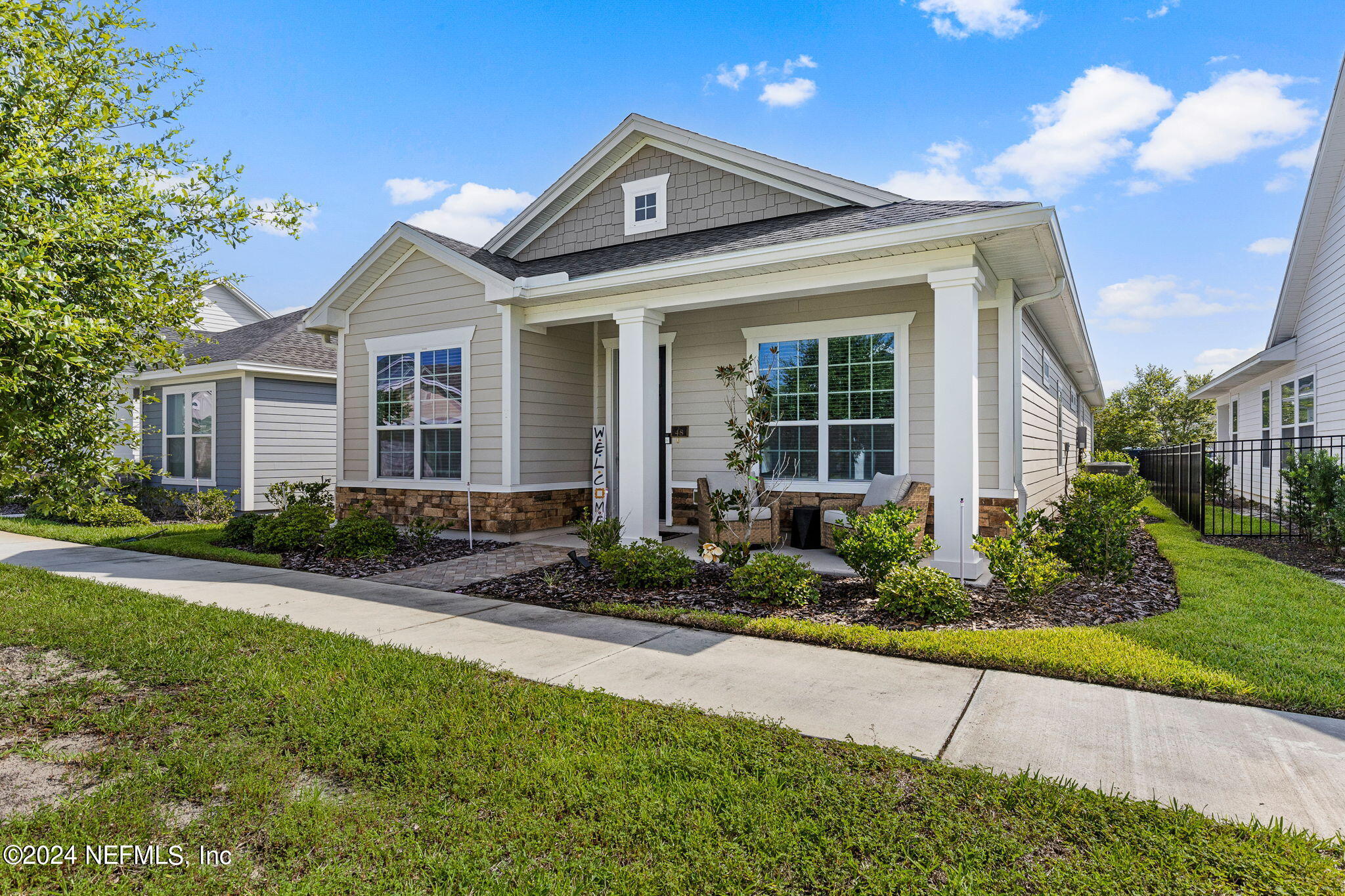 48 Bluebonnet Way St. Augustine, FL 32092 - Photo 4 of 47 a front view of a house with garden