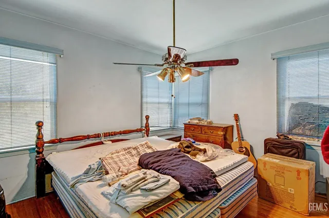 a bedroom with furniture and a window