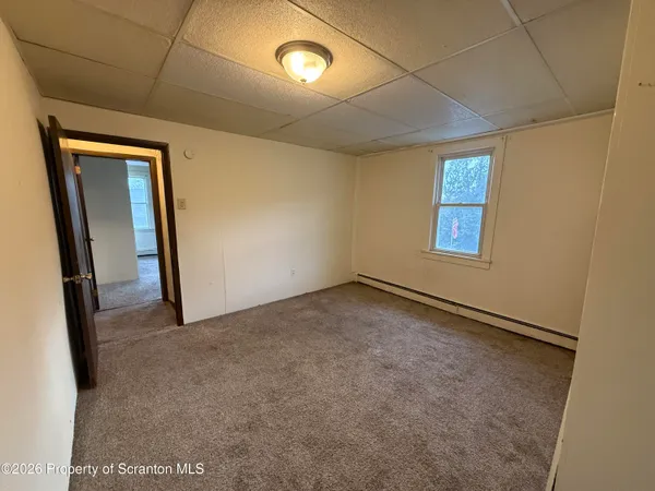 an empty room with windows
