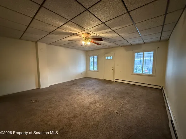 a view of a livingroom with a fireplace
