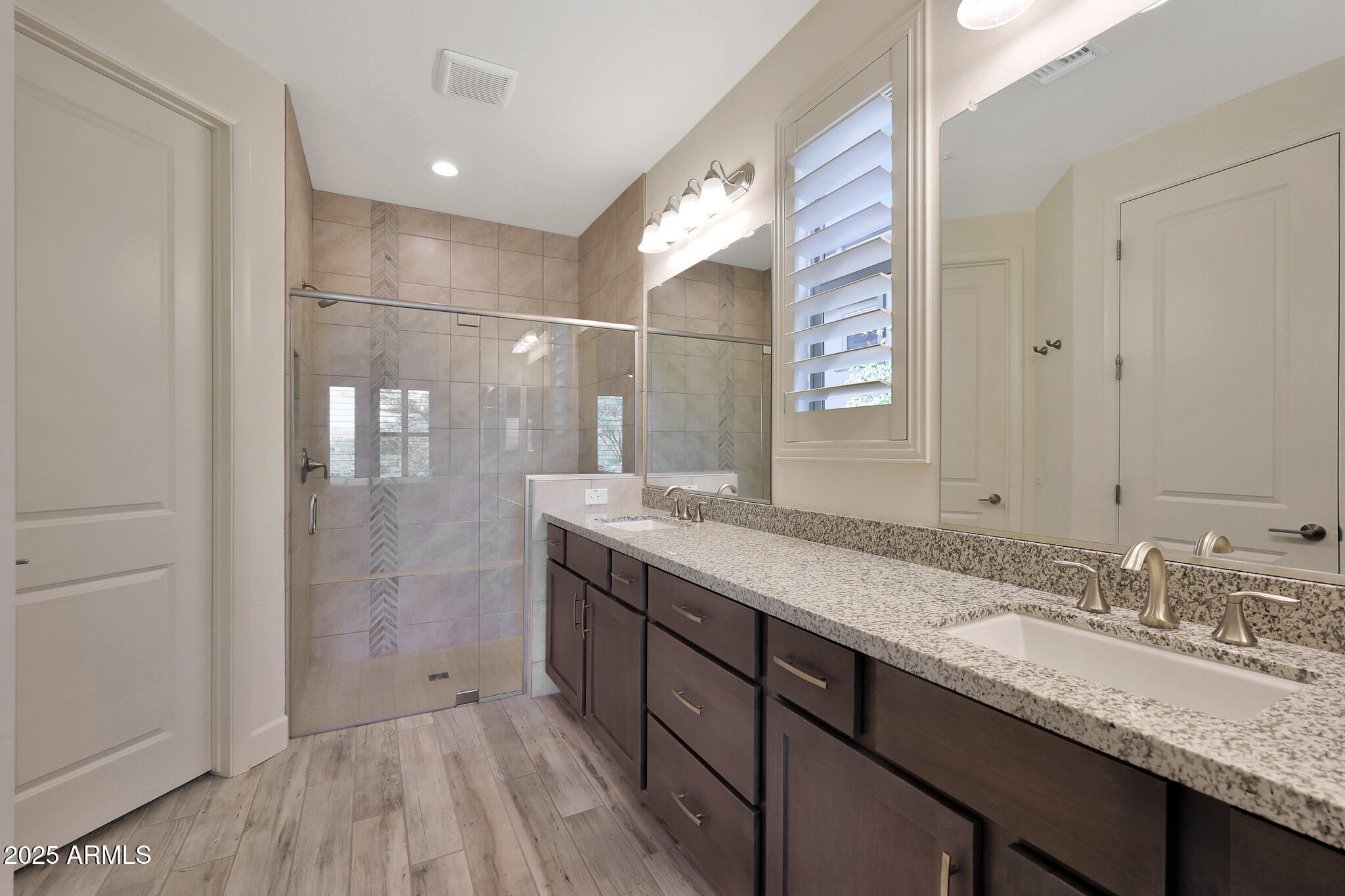 17940 East Cindercone Road Rio Verde, AZ 85263 - Photo 18 of 42 a bathroom with a granite countertop sink mirror and double