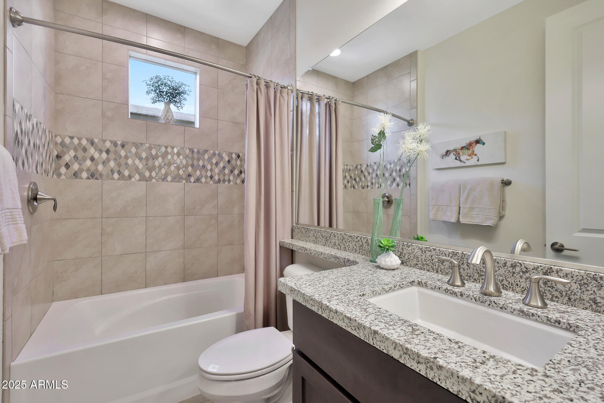 17940 East Cindercone Road Rio Verde, AZ 85263 - Photo 21 of 42 a bathroom with a granite countertop sink a toilet a mirror a vanity a bathtub and shower