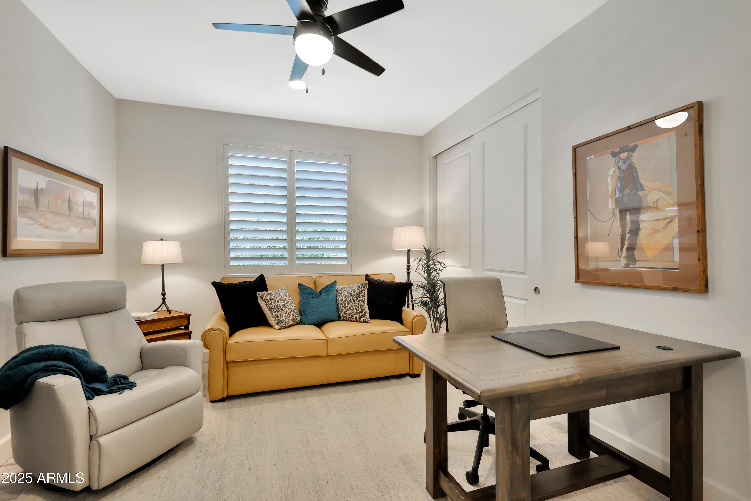 17940 East Cindercone Road Rio Verde, AZ 85263 - Photo 2 of 42 a living room with furniture and a window