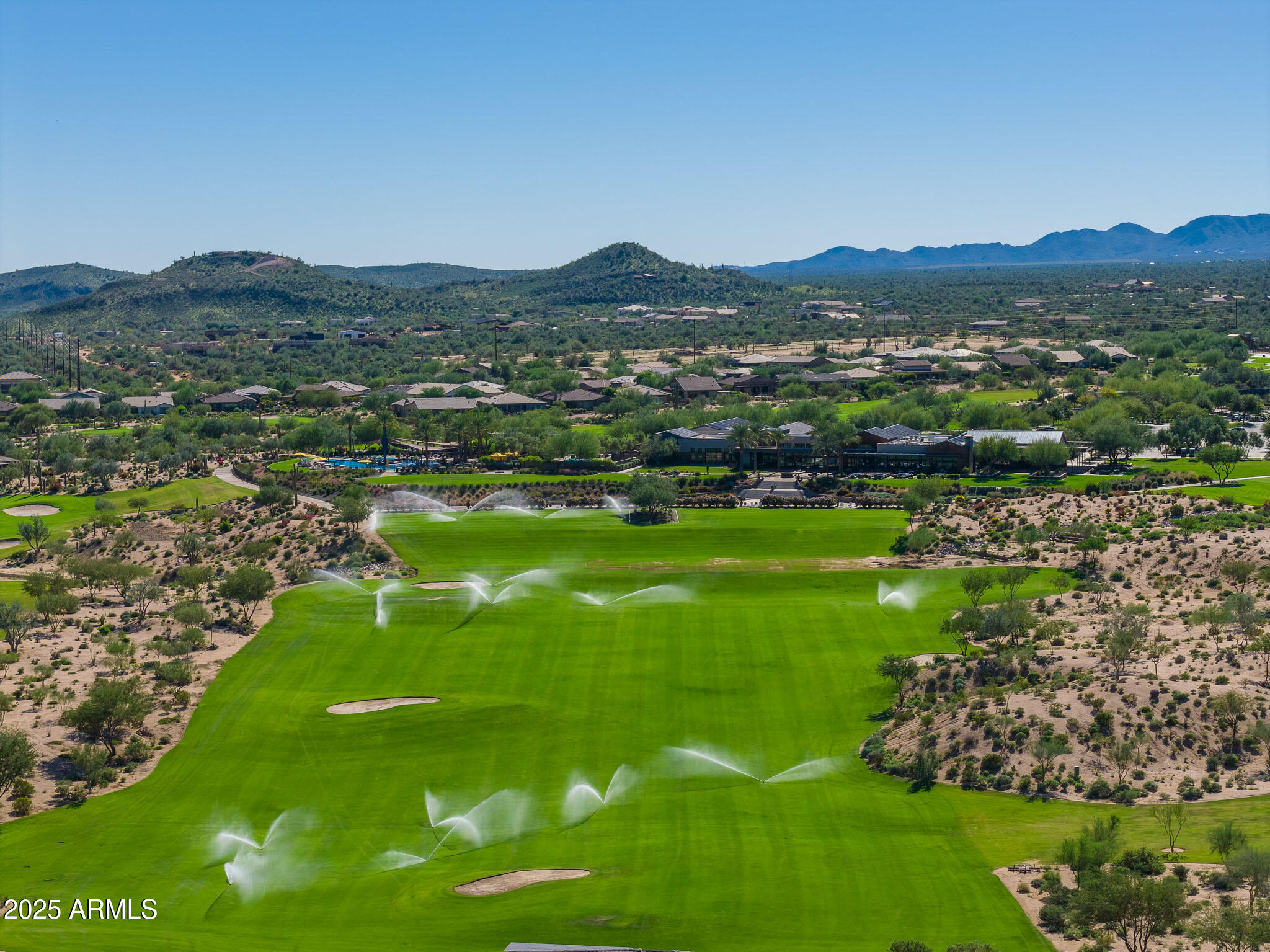 17940 East Cindercone Road Rio Verde, AZ 85263 - Photo 35 of 42 a view of a town with mountains in the background