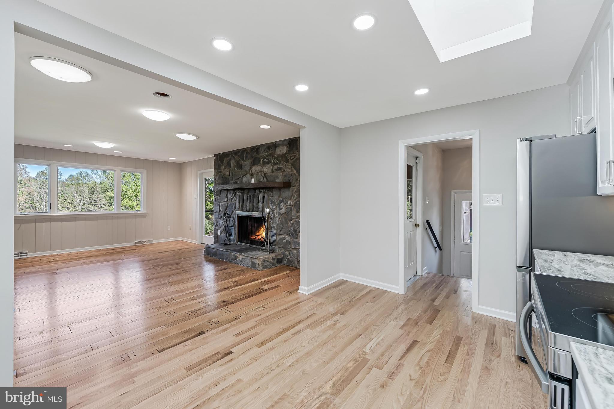 6891 Wilson Road Marshall, VA 20115 - Photo 63 of 118 Bright, airy space with cozy fireplace.