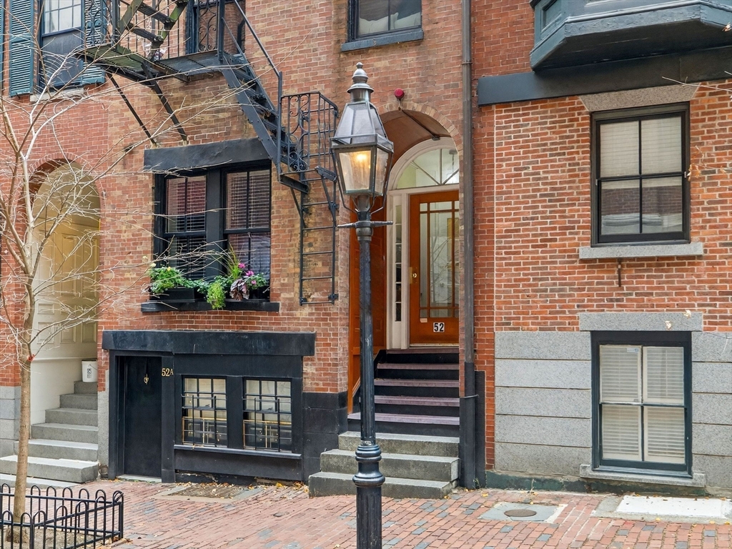 52 Temple Street Boston, MA 02114 - Photo 2 of 34 a front view of a house