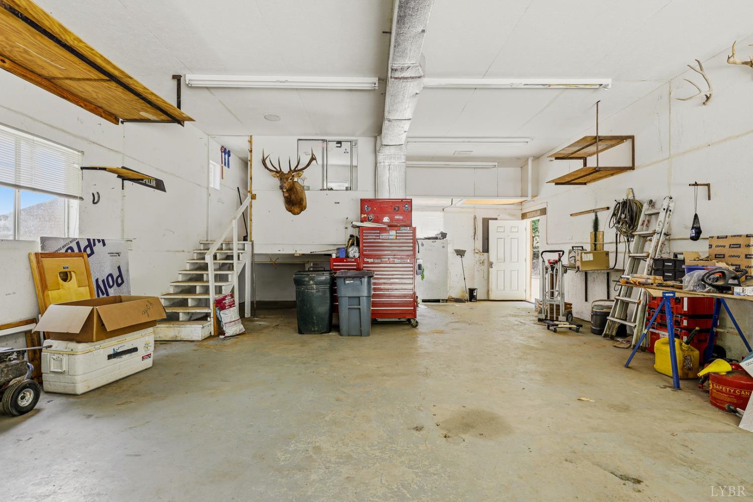 809 Plantation Road Amherst, VA 24521 - Photo 48 of 77 a view of a garage with storage