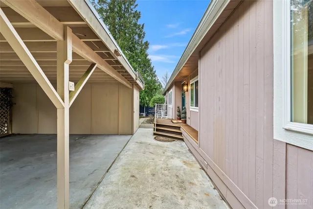 a view of a building in the middle of a field