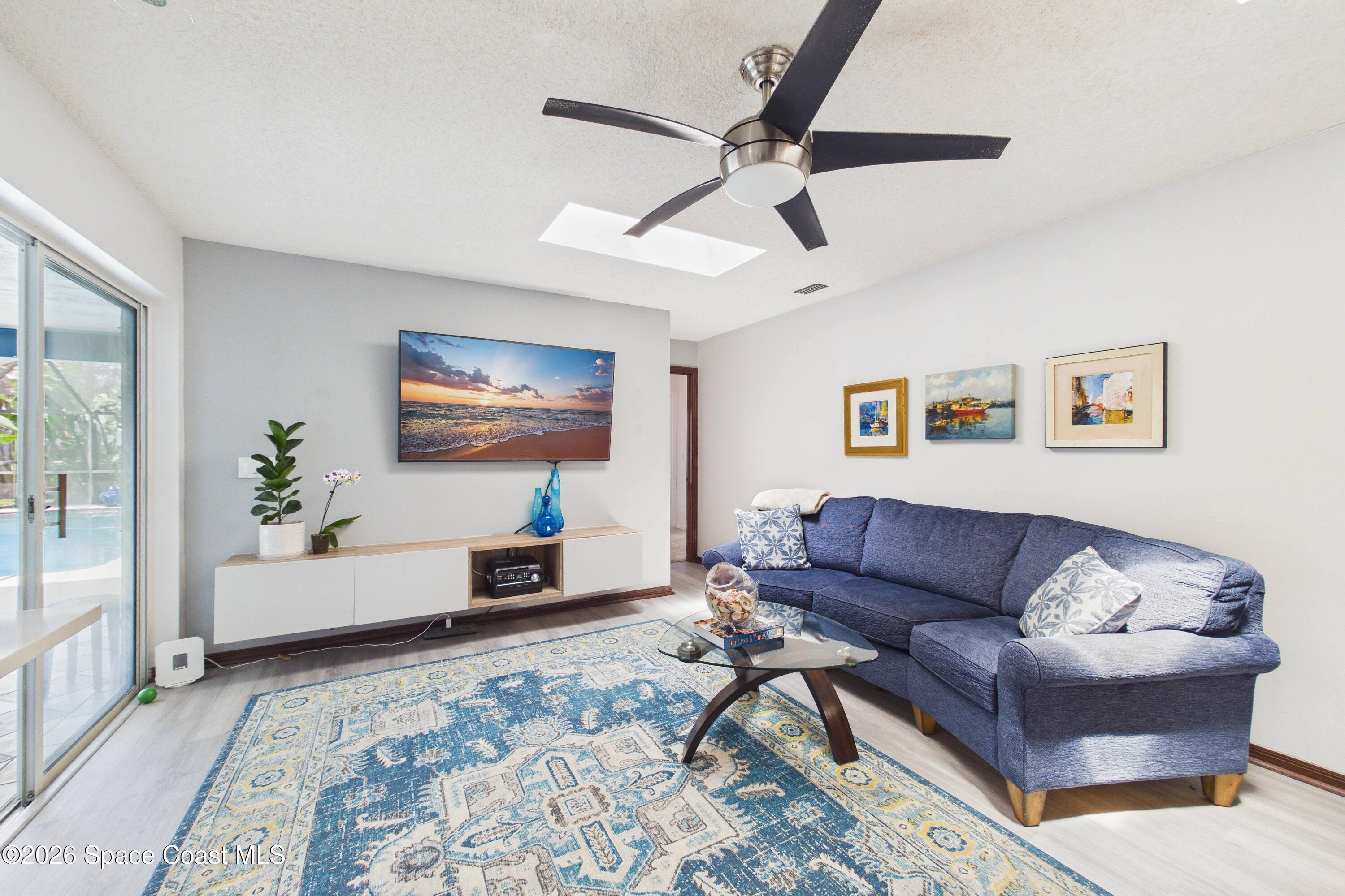 280 Coral Way West Indialantic, FL 32903 - Photo 21 of 72 a living room with furniture and a window