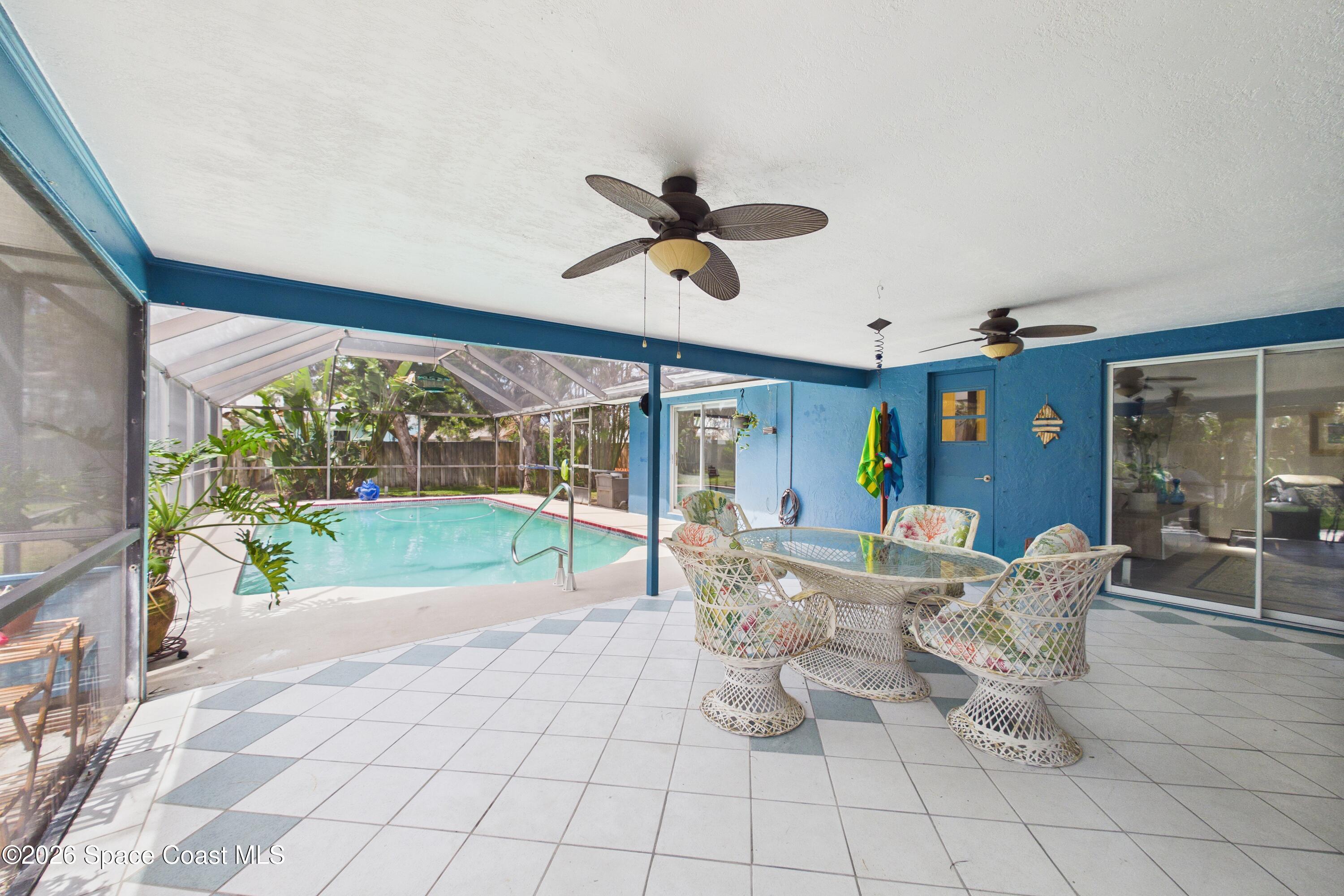 280 Coral Way West Indialantic, FL 32903 - Photo 46 of 72 a view of a dining room with furniture window and outside view
