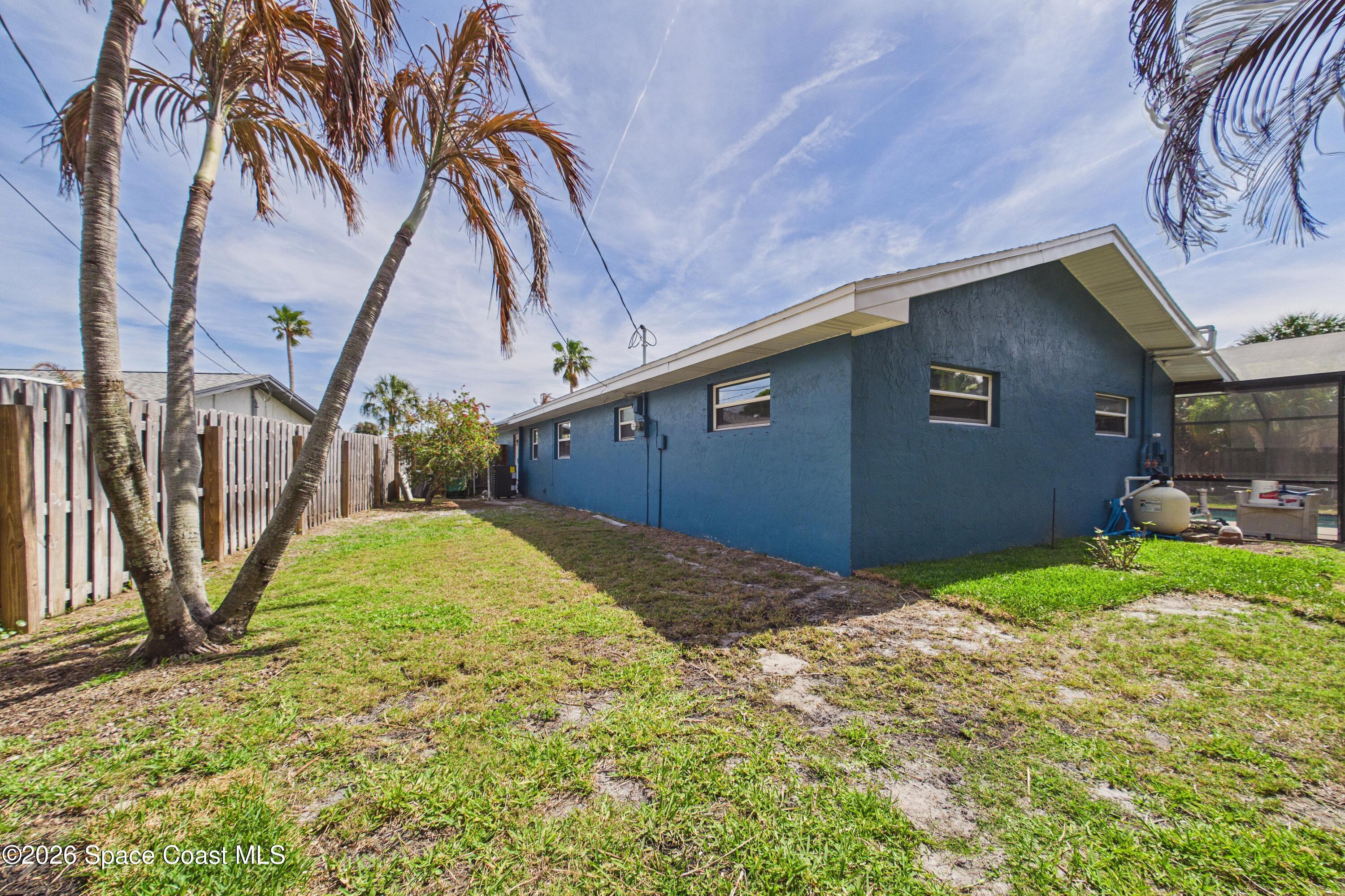280 Coral Way West Indialantic, FL 32903 - Photo 57 of 72 a view of backyard of a house
