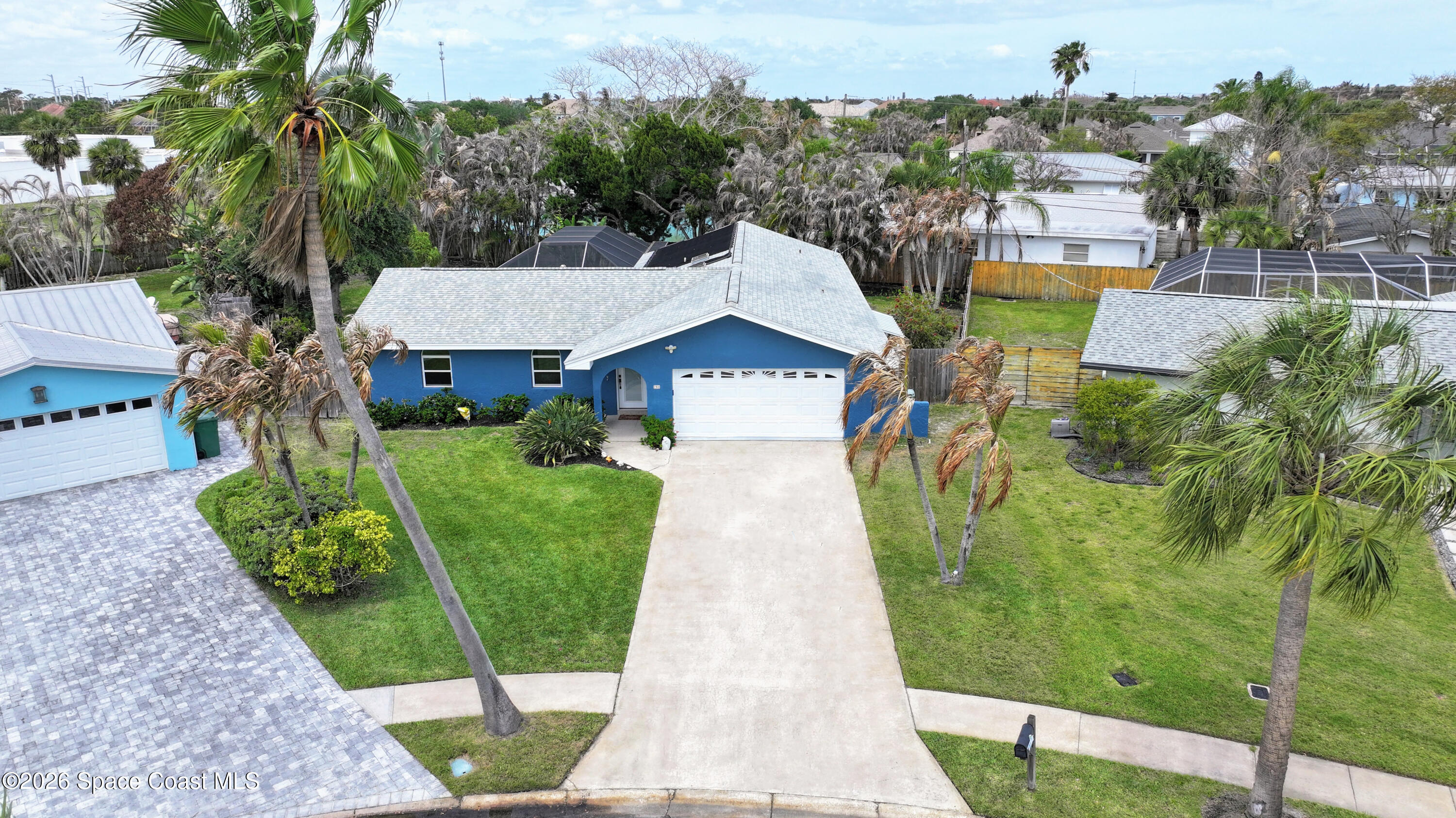 280 Coral Way West Indialantic, FL 32903 - Photo 63 of 72 a aerial view of a house with a yard table and chairs