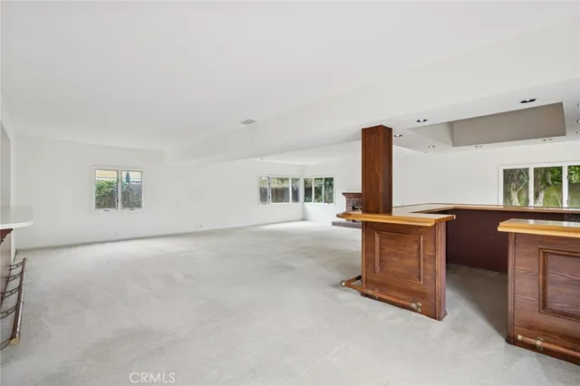 a view of workspace with furniture and window