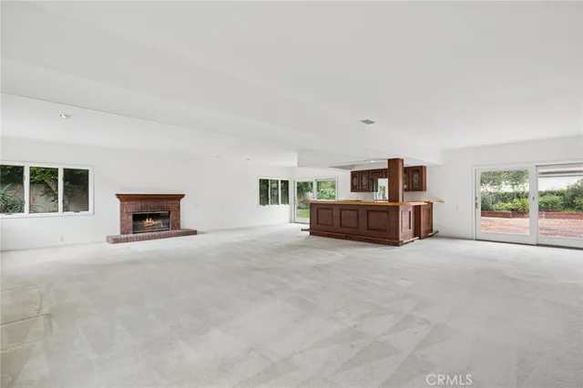 a big room with closet and windows