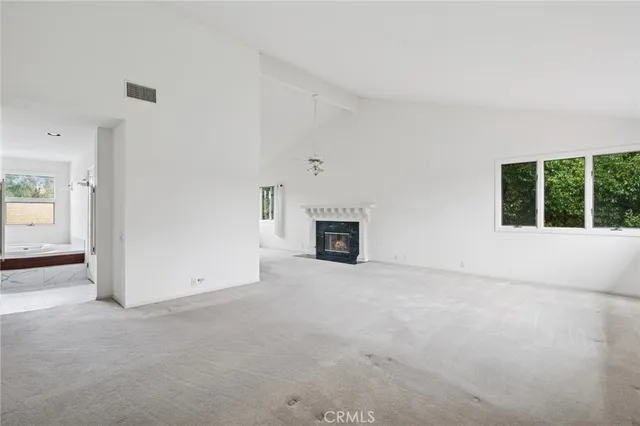 an empty room with windows