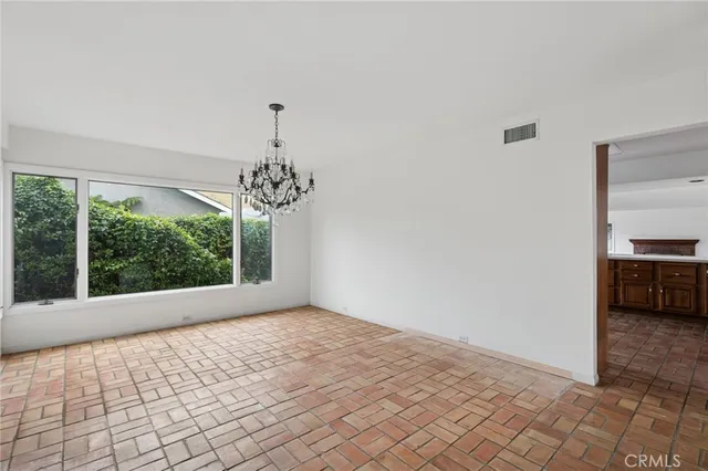 a view of a room with a large window