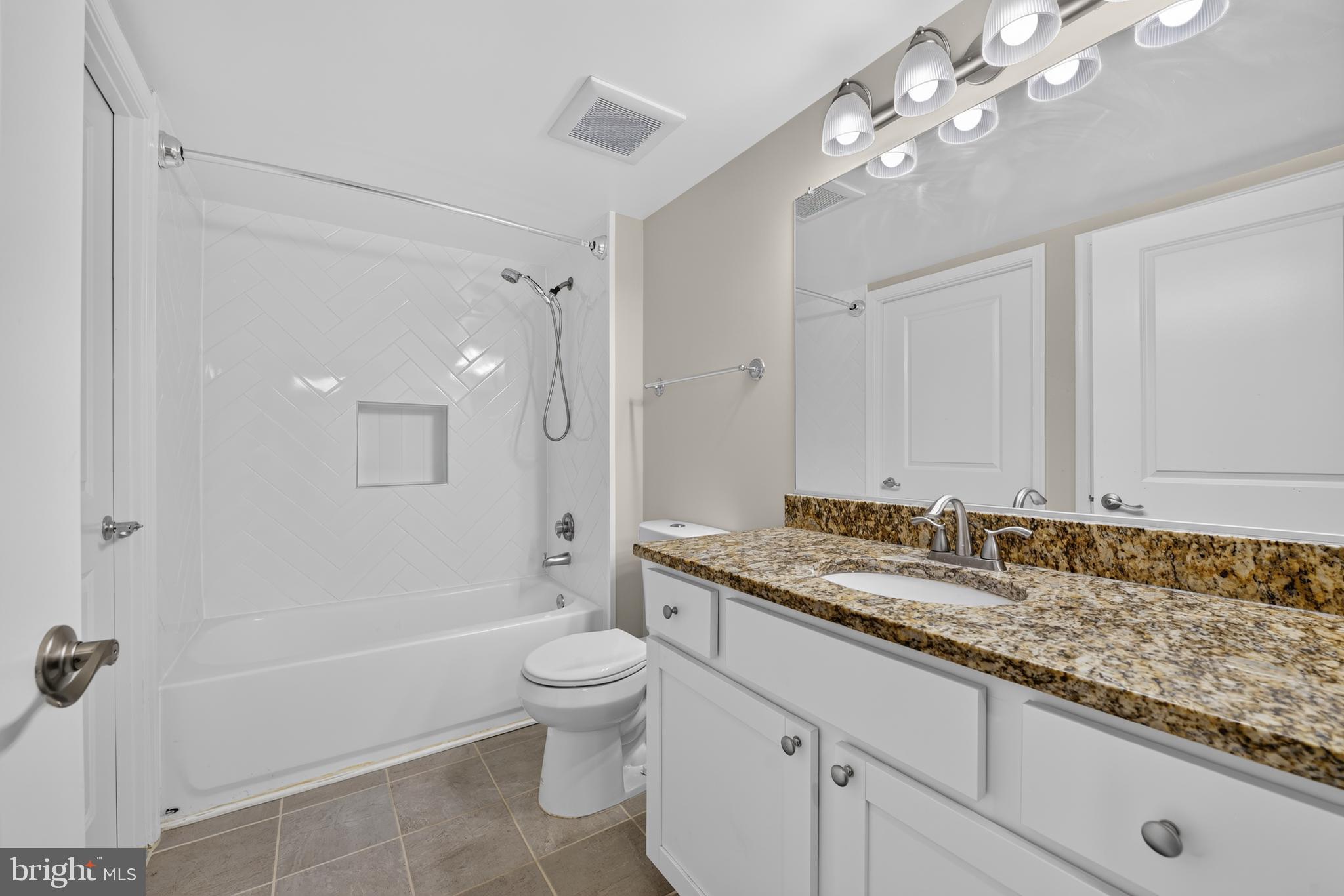 11800 Sunset Hills Road, Unit 212 Reston, VA 20190 - Photo 11 of 22 Newly remodeled bathroom w/ new,tile,flooring