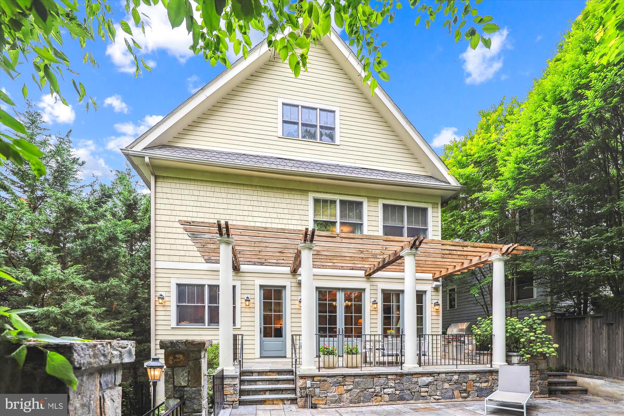 2213 King Place Northwest Washington, DC 20007 - Photo 36 of 40 a front view of a house with a yard
