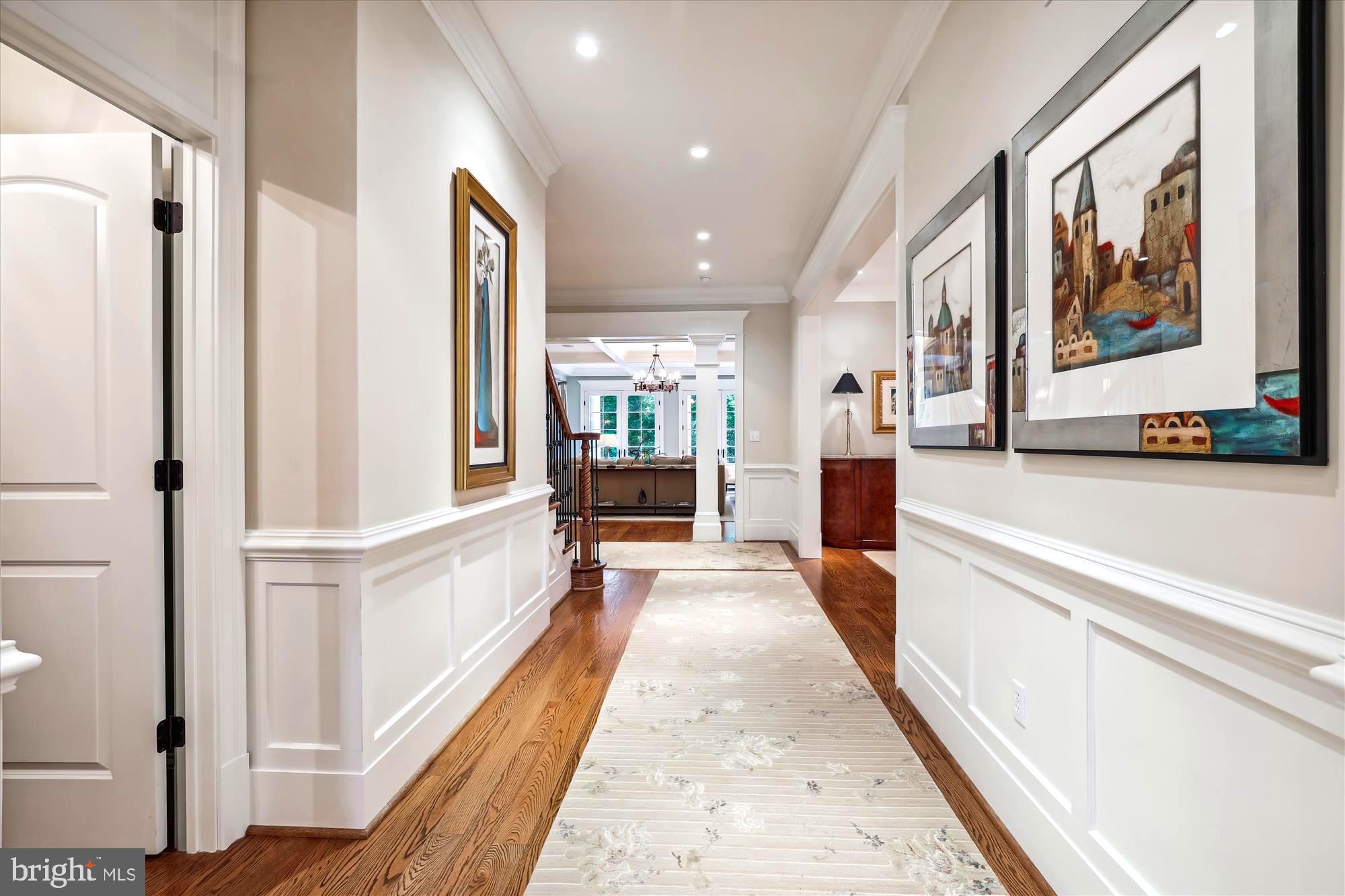 2213 King Place Northwest Washington, DC 20007 - Photo 6 of 40 a view of a hallway with wooden floor and staircase