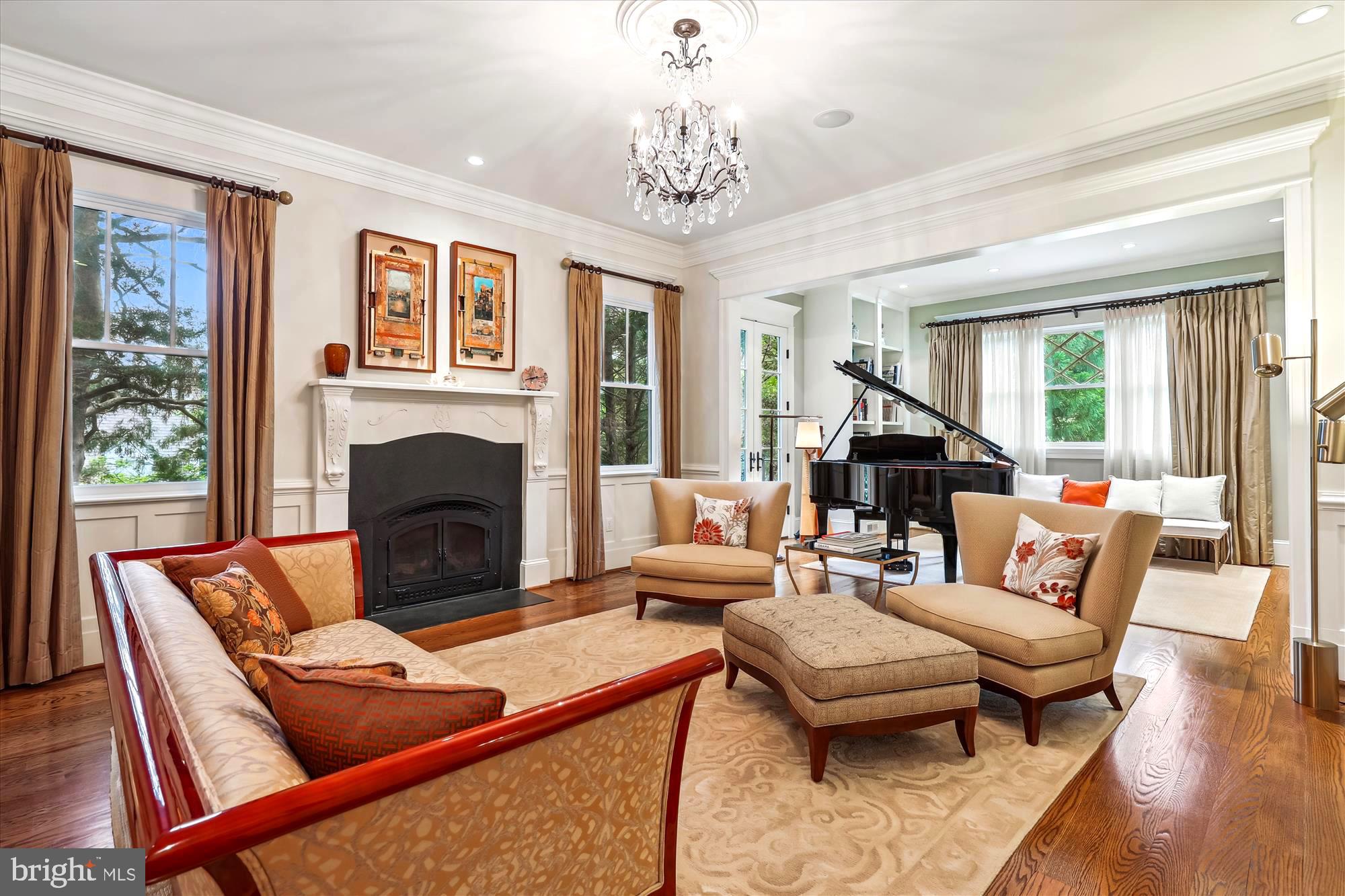 2213 King Place Northwest Washington, DC 20007 - Photo 7 of 40 a living room with furniture a large window and a fireplace
